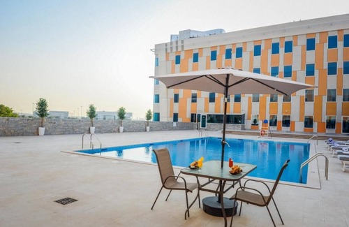 Academic City Apartment | Standard Room Near University of Birmingham Dubai