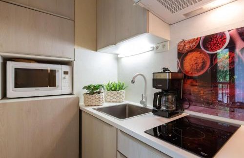 Vignec Apartment | Studio 4 pers à Saint Lary avec Wifi gratuit, balcon sud, jacuzzi, salle de gym, sauna et parking - FR-1-296-470