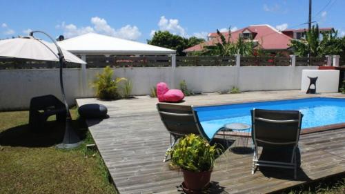 Baie-Mahault Apartment | Studio accueillant à Baie Mahault, 22 m², piscine partagée.