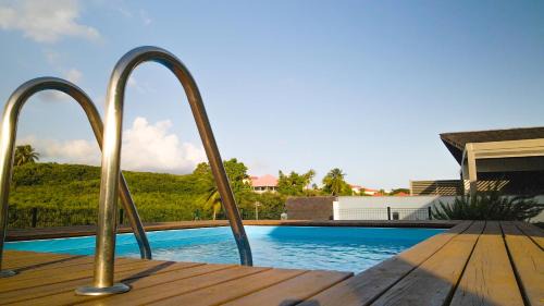Sainte-Anne Apartment | Studio avec piscine, à 3 minutes à pied des plages