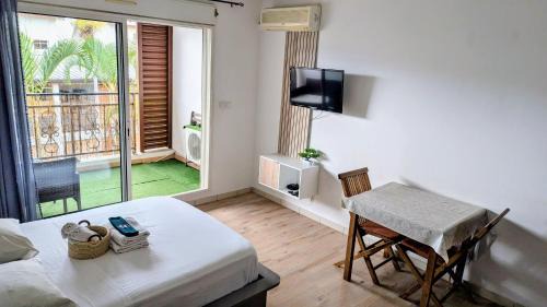 Sainte-Clotilde Apartment | Studio climatisé proche aéroport, navette