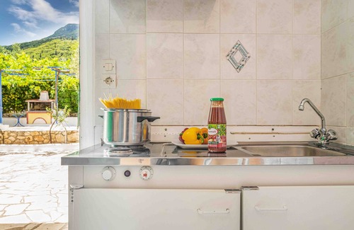 Vathy Apartment | Studio 'Veronis 3' with Sea View, Shared Pool & Wi-Fi