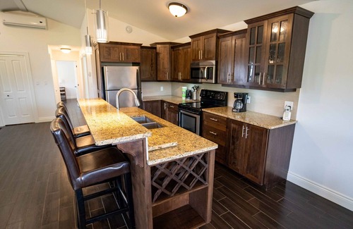Stanley Bridge Condo | Stunning home away from home with outdoor fireplace
