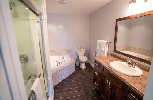 Stanley Bridge Condo | Stunning home away from home with outdoor fireplace