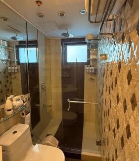 Ortigas Center Apartment | Stylish 1BR, sunset view, netflix, parking, fast Wi-FI
