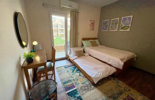Sheikh Zayed City Apartment | Stylish Egyptian Charm 2BR in Karma Residence for families & single travelers