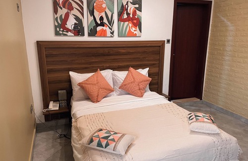 Labone Hotel | Stylish hotel room in Osu