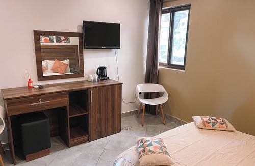 Labone Hotel | Stylish hotel room in Osu
