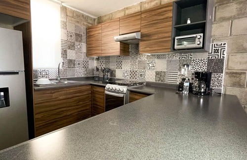 Downtown Guadalajara Apartment | Stylish urban loft with access to gym and work rooms.