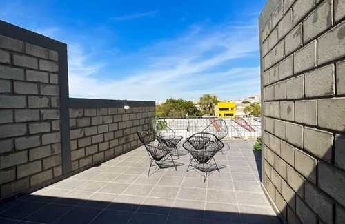 Downtown Guadalajara Apartment | Stylish urban loft with access to gym and work rooms.