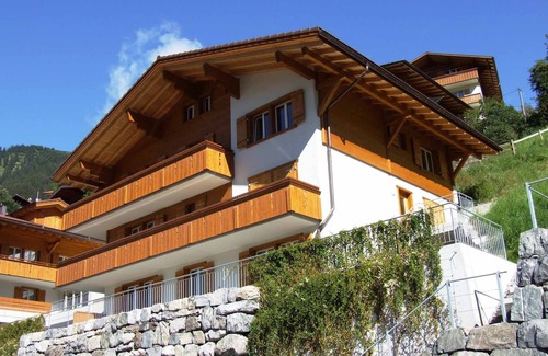 Adelboden Apartment | Stylishly furnished vacation apartment near the mountain railroads.