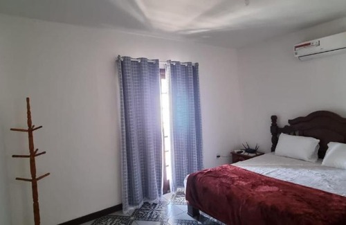 Foguete House | Suítes em Cabo Frio, Praia do foguete