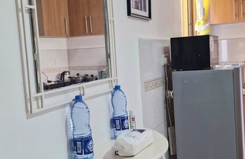 Ngara Apartment | Sunlit hideaway blending city convenience with cozy charm and local insights.