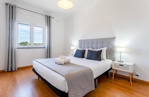 Albufeira Apartment | Sunny 3BDR Apt with Pool in Ferreiras by LovelyStay