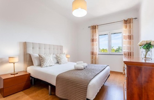 Albufeira Apartment | Sunny 3BDR Apt with Pool in Ferreiras by LovelyStay