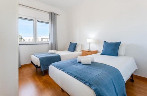 Albufeira Apartment | Sunny 3BDR Apt with Pool in Ferreiras by LovelyStay