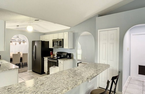 Sunridge Woods Villa | Sunridge Siesta | Beautiful pond facing pool home