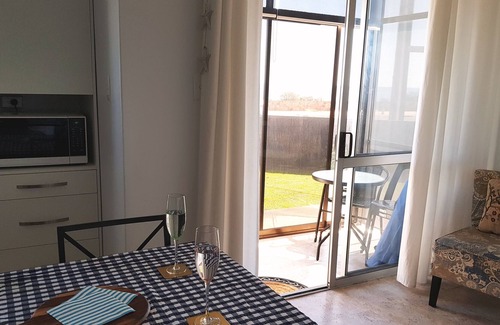 West Beach Apartment | Sunset beachfront escape