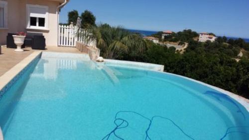 Favone Villa | Superbe villa vue mer avec piscine a debordement