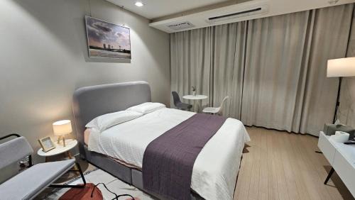 Suyeong-Gu Apartment | SWITZEN KCC ocean view