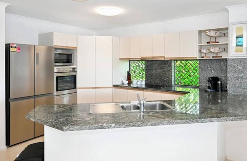 Golden Beach Apartment | Take time to look through the stunning photos of this unique waterfront home.
