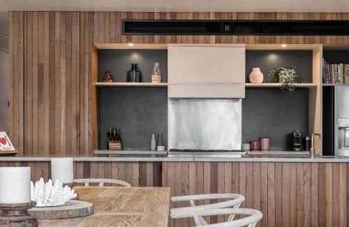 Suffolk Park House | Tallowood - luxury beach house with pool & studio