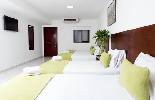 Granada Hotel | TAMA Hotel Granada Real Cali