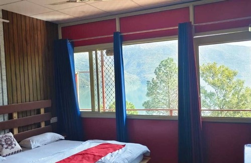 Tehri Resort | Tehri lake View Camping and Cottage