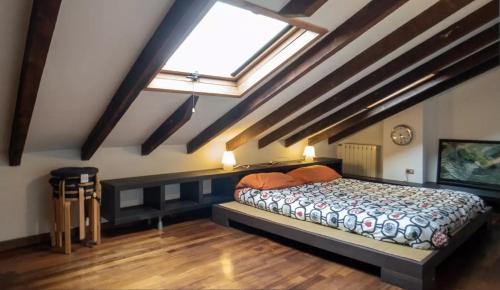 Casoretto Apartment | The attic of Milan with terrace city view