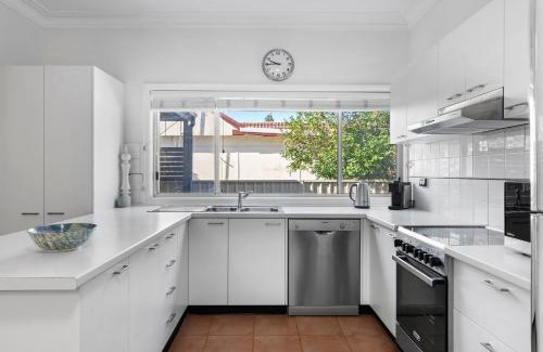 Budgewoi House | The Lazy Mimosa from beach days & bike rides to sunset drinks by the fire pit.