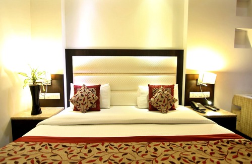 Paharganj Hotel | The Prime Balaji Deluxe @ New Delhi Railway Station