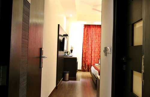 Paharganj Hotel | The Prime Balaji Deluxe @ New Delhi Railway Station