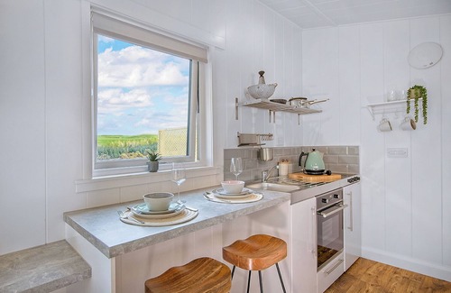 Castle Douglas Ski Chalet | The studio lodge is perfect for couples.