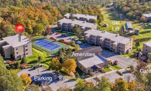 Sugar Mountain Apartment | The Sugar Suite - Renovated with a View! Ski IN-OUT! Heated POOL, Hot tub, sauna, gym, AC, EV