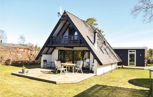 Haslevgarde House | Three-Bedroom Holiday Home In Hadsund