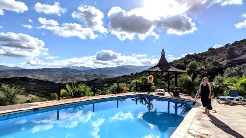 Alozaina House | Tiny house 12m2 in holiday park with 55 m2 pool
