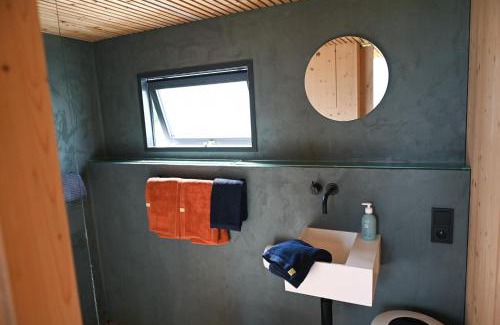 Wangerland House | Tiny House Pioneer 7 Naked - Green Tiny Spot Hooksiel im FKK-Bereich