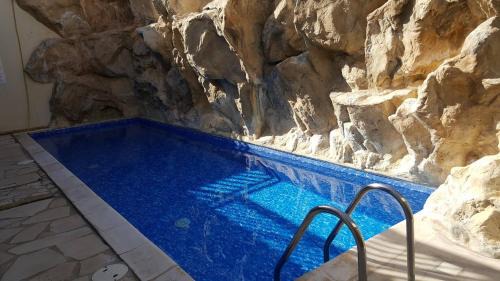 Peyia Town Apartment | Top floor 2 bedroom apartment E101, 3 pools, sea view, FREE WIFI