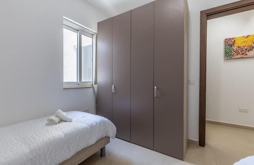 Marsaxlokk Apartment | Top floor apt - Minutes walk to the seafront