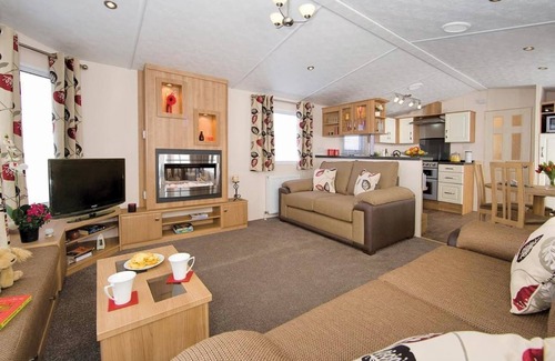 Burnham-on-Sea House | Top of the range 12ft-wide caravan with one double and one twin.