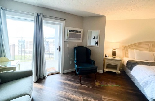 Traverse City Condo | Traverse City studio condo on Sandy Beach. Ground floor. Outdoor pool. A/C.