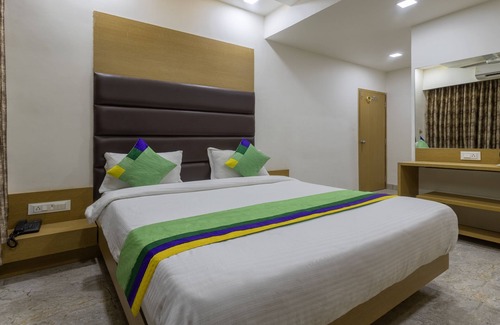 Ahmedabad Hotel | Treebo Eden Park, Ahmedabad