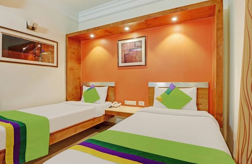 Stage 1 Hotel | Treebo Suraksha Inn