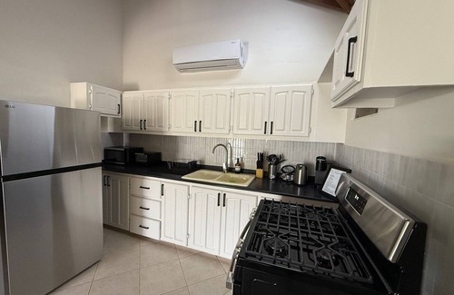 Fitches Creek House | Tropical Bliss Retreat – 3BR Oasis near Beach, St. John’s & Airport