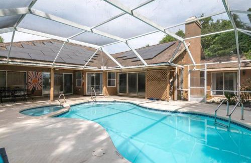 Palm Coast House | Tropical Escape with Relaxing Pool & Palm Breezes