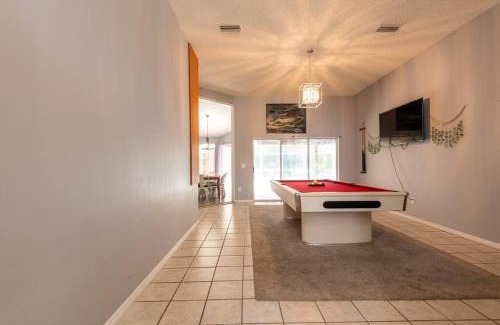 Palm Coast House | Tropical Escape with Relaxing Pool & Palm Breezes