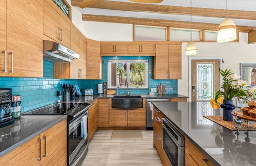 Cocoa Beach House | Tropical Riverfront Retreat w/Heated Pool, Spa, Tiki Hut & Dock! 🌴
