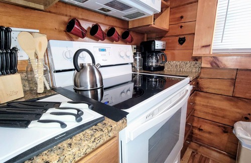 Gatlinburg - Pigeon Forge Cabin | True Log Cabin w/Beautiful Views! LED Hot Tub, WiFi, Picnic Pavilion, Grill Area