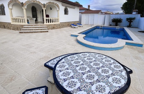 Miami Platja Ski Chalet | Typical villa with private pool in Miami Platja!