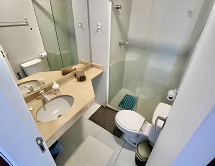 Armacao Apartment | UNU Studio Armação; Frente/Vista mar, piscina e +